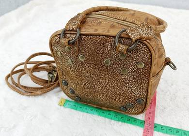 Full brown leather mini sling bag