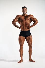 Men physique posing trunk