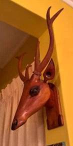 antique wooden deer head with horns