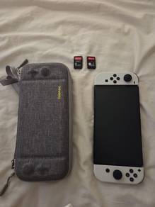 NINTENDO SWITCH OLED with case + 2 game cards