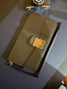 LV Taiga Leather Belaia Clutch