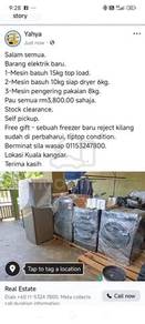 mesin basuh dan pengering pakaian