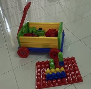 Toy storage cart with colourful building blocks