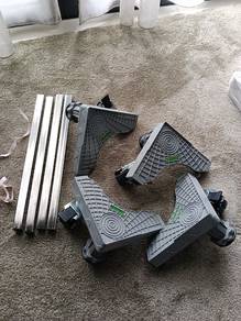 Adjustable washing machine and refrigerator roller