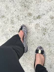 Salvatore Ferragamo Varina Flats In Black & White