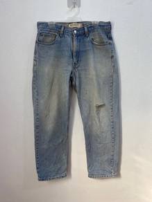 Levi’s 550 Relaxed Fit Light Wash Distressed Denim