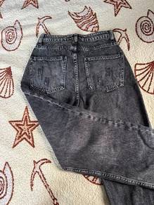 Acid wash high waist baggy jeans with raw hem
