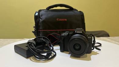 Canon R50 + Kit Lens (SC:700+)