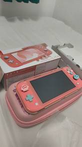 Nintendo switch lite coral pink